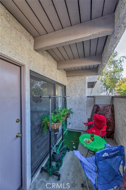 Patio area with sliding glass door.