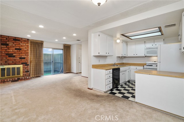 Kitchen, Dining Area, and Living Room