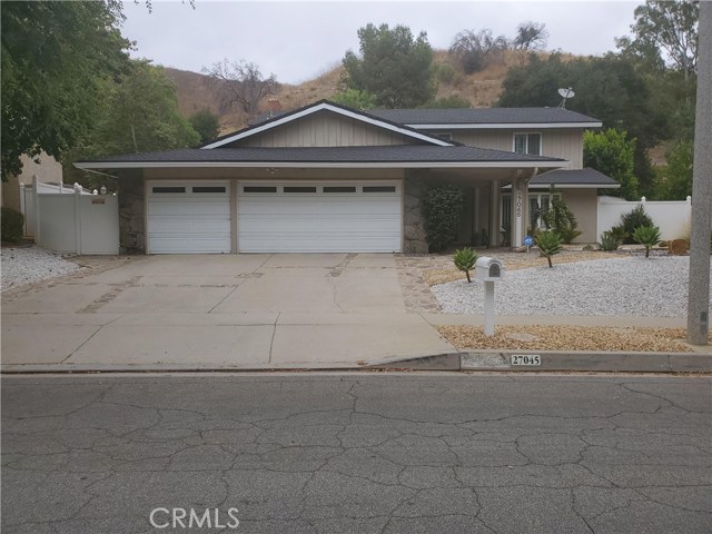 27045 Esward Drive Calabasas, California Calabasas home nestled in the Saratoga Hills neighborhood with 5 bedrooms, 3 baths. One bedroom/one bath on main floor. Remodeled open concept kitchen to the family room, offering subzero refrigerator; viking professional 6 burner stove; double oven; and viking microwave; center island; granite counters; large pantry; custom cabinets has plenty of storage with soft close and roll outs; Italian porcelian tile and marble flooring, shutters, recessed lighting throughout, 2 separate HVAC units for upstairs and downstairs; master bedroom offers a wood burning fireplace, ensuite bathroom with dual sinks, separate commode and bidet, plus walk-in closet. Outdoors offers sparkling pebble pool and Jacuzzi, plus lots of room to entertain and lounge with covered patio, and stamped concrete. Outside SHED for extra storage and 3 car garage. Award winning Las Virgenes Schools. Easy access to hiking, biking, freeways and short commute to the westside and beaches. Includes pool, gardener and pest control services.