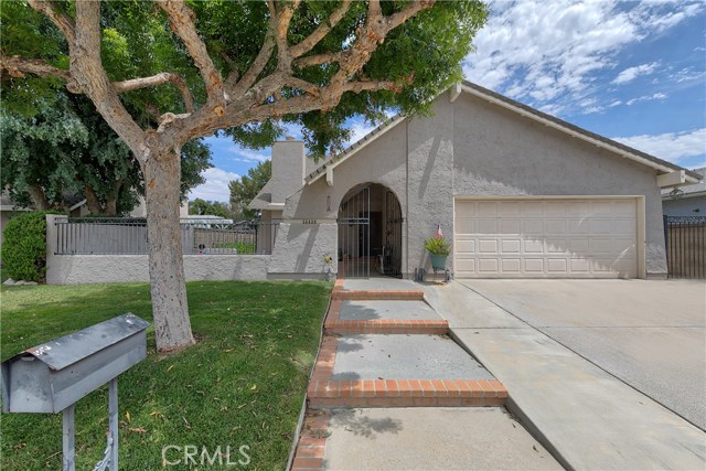 25438 Via Heraldo Valencia, California Stunning home! Absolutely turn-key! New Price! Own one of the best layouts in Valencia! 4 bedrooms with expansive loft. Vaulted ceilings, Milgard dual pane windows and slider; Ceilings fans in each bedroom; Updated bathrooms with granite counter tops, chrome fixtures and custom light fixture. Open, upgraded kitchen with spacious island, lots of cabinets, granite counter tops, recessed lights and new dishwasher. Lots of outdoor space to enjoy, including the front courtyard and backyard--with lovely patio cover, and plenty of grass. Full copper re-pipe, newer HVAC and water heater; All electrical replaced; Attached 2 car garage. Great cul-de-sac location! No HOA or Mello Roos. Conveniently located near shopping, hospital, paseo system, parks and the 5 freeway. This one won't last!