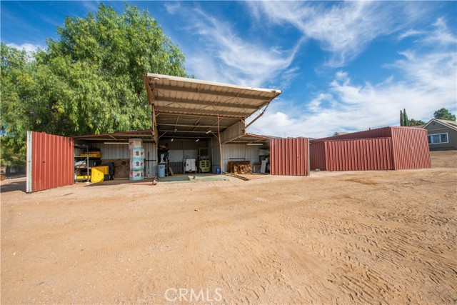 2 deep steel garages 30' x 15' with more storage area in the wings.