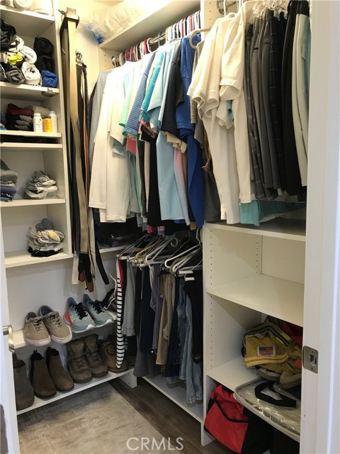 Primary bedroom walk-in closet