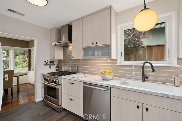 Galley kitchen with stainless steel appliances