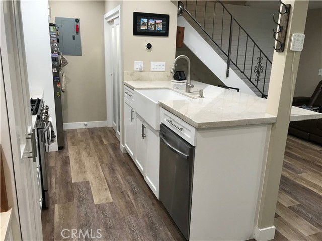 View of kitchen from dry bar area