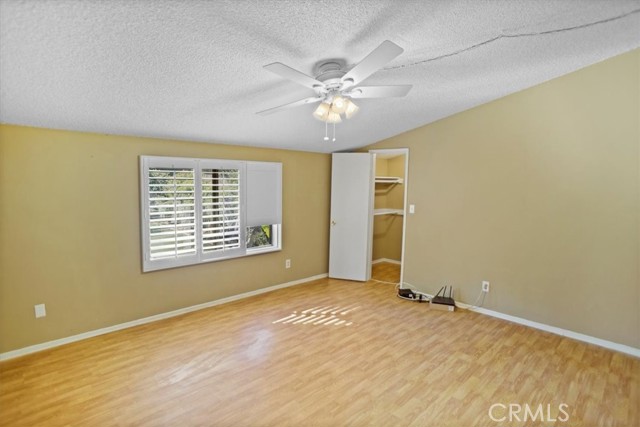 Bedroom with walk in closet