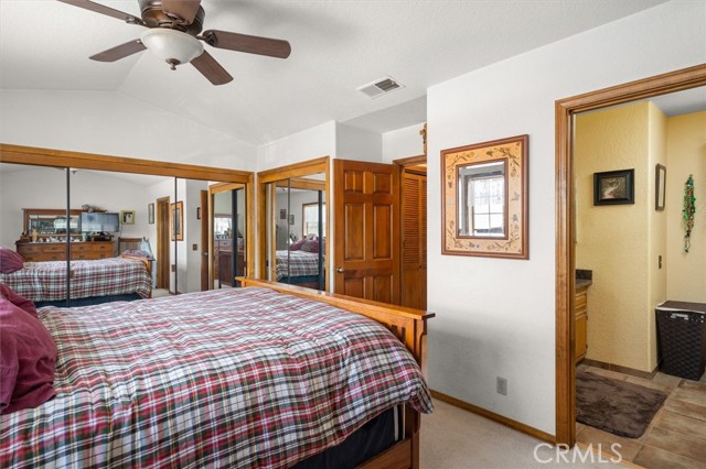 Master bedroom Ceiling Fan & Mirrored Closet doors with Wood Frames