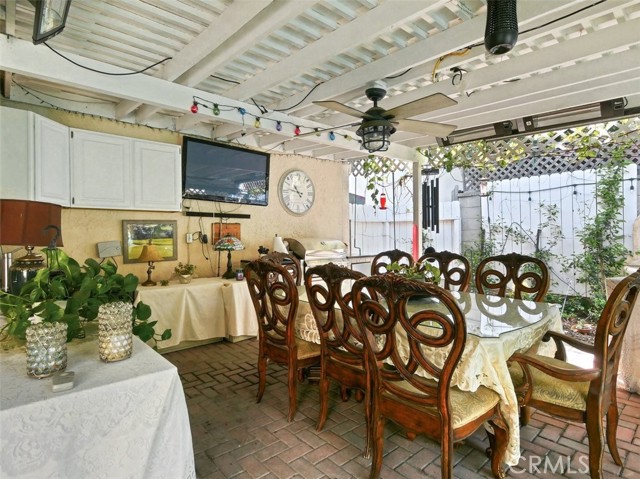 Patio with kitchenette, TV, dining