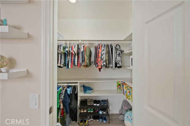 Bedrooms each with walk-in wardrobes.