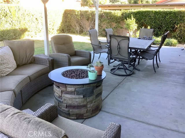 Covered patio and backyard