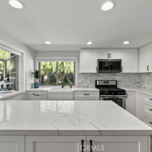 Remodeled Kitchen down to studs, Custom Cabinets, Quartz Counters, Tile Backsplash