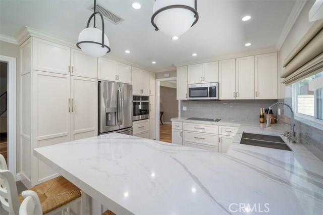 Custom Maple cabinets, Quartz counter top