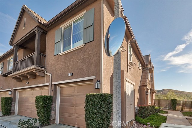 19374 Laroda Lane Saugus, California Awesome Condo off Plum Canyon in the Beautiful Mariposa Community! Fantastic Studio-loft set up! Single car garage downstairs and open living space upstairs. Upgraded Maple Kitchen Cabinets with Breakfast bar and Stainless steel appliances. Carpet throughout. Lots of windows. Light and Bright! Fireplace in living room. Laundry room downstairs with full size washer and dryer. Close carport space also included. Low HOA! Community pool, spa and playground. Incredible opportunity!
