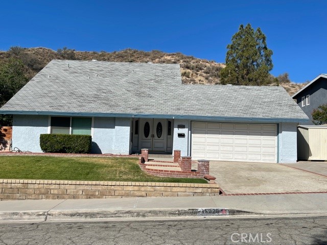 15028 Daffodil Avenue Canyon Country, California This 2-Story 4+3 is to be sold in AS-IS condition, some paint and a few fixes will make it your new home! Tile and laminate flooring throughout 2268sqft of living space. Living room has gas fireplace with a sliding door leading to a large yard with swimming pool and spa, BBQ and fire pit included. Kitchen offers lots of cupboards and granite counters, refrigerator included. A spacious downstairs room with attached bathroom could be used as a large bedroom suite or bonus room. Upstairs a huge master suite and bathroom can be found with a luxury soaking tub, separate shower and walk-in closet area. Two storage sheds are included on the side yard. Direct access to a 2-car garage which includes a washer/dryer. No rear neighbors!