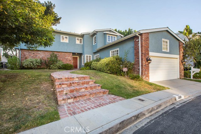 2369 Nalin Drive Bel Air, California Located in prestigious Bel Air Hills this original cottage style home is waiting for finishing touches! The private cul-de-sac street has amazing canyon views and most sought-after sidewalk safe streets with privacy. The back yard has a small grassy area and the patio has plenty of room for expansion. The living room has classic hard wood floors and crown molding with a cozy fireplace. There is a formal dining room and family room. The kitchen includes a brand new double oven and newer range. There is study next to the kitchen which can be removed to expand the kitchen. The two car garage provides direct access and has an extra large room above for storage. Upstairs there are 3 large bedrooms with extra storage space. The featured bedroom has an extra large bathroom with jacuzzi tub and walk-in shower and dual sinks. The potential is endless in this light ,bright original classic!!! Make this 2700 sq. ft. home to your liking! There is also easy access to Brentwood, Westwood, the Valleys, shopping, and studios! This is a must see!
