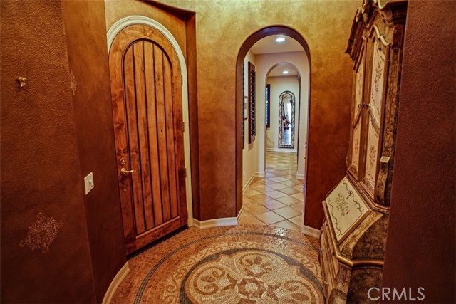 Stunning Foyer with Mosaic Tilte