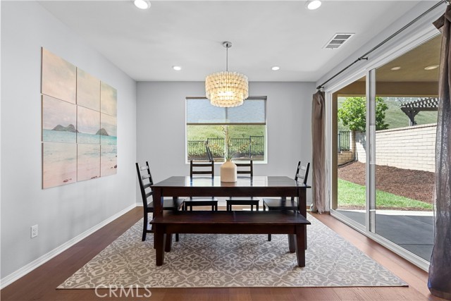 separate dining room with lush view