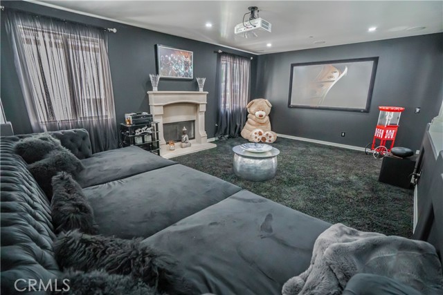 Open Family Room with cozy Fireplace