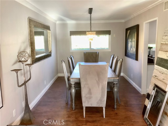 Gorgeous light fixture in dining room