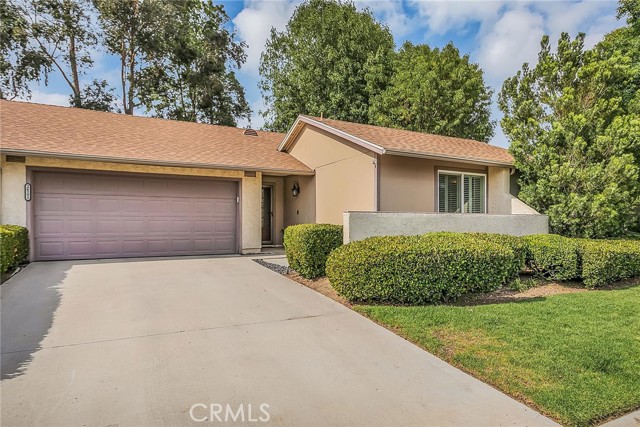 26293 Rainbow Glen Drive Newhall, California Wow welcome to this turnkey home in the gated Scenic Hills community. This home has everything and will sell fast. Entering this home you will be greeted by this Beal's Hickory flooring throughout. A very spacious living room with a fireplace for those cozy evenings. The upgraded kitchen with stainless steel appliances and custom cabinets with granite counter tops. Also enjoy using the large crushed granite sink. This home has vinyl windows throughout. In the master bedroom you will find a newly custom barn door leading into the walk in closet and bathroom. All of the bedrooms are very cozy with ceiling fans. You will enjoy looking at the walls throughout as the owners selected really custom colors that really look fabulous. The two car garage is very spacious and offers a lot of storage space. Entering the patio off the kitchen or living room you will have your dinners or a glass of wine surrounded by a private vinyl fence. The patio also has a natural gas BBQ hook up for those who love cooking ribs and a tri-tip. There are to many things to list as this home and community offer so much. Please come and see this beautiful charming home. This one will not last