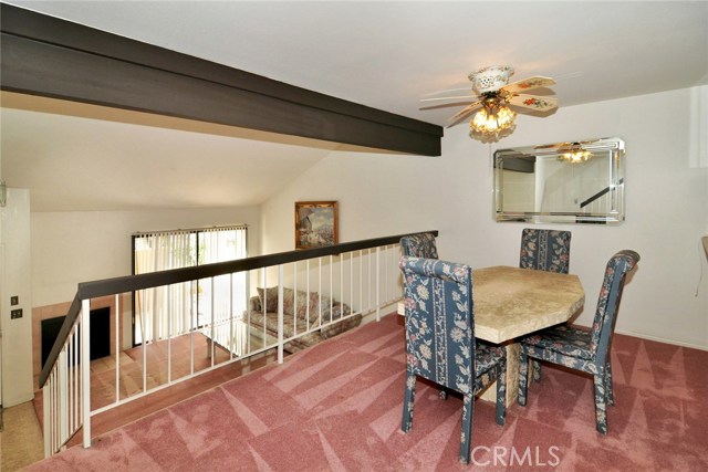 Formal dining room overlooking living room.