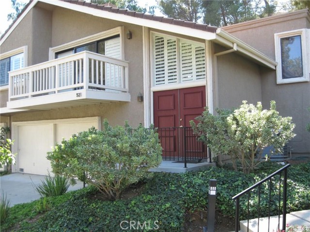 Front view of property with large attached two car garage