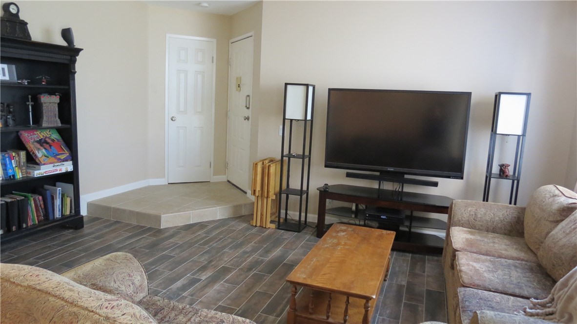 New tile wood-like floor, entry with tile floor