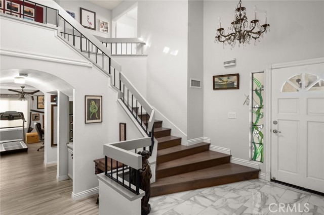 Gorgeous Staircase with Walnut Hastings Wide Plank Hardwood Flooring