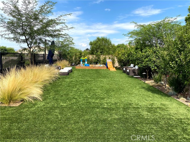 Side yard with artificial turf