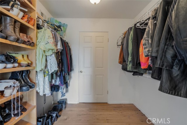 One of two walk in closets.  Cedar closet behind door