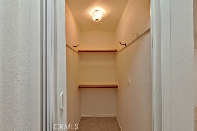 Walk-in closet in second bedroom