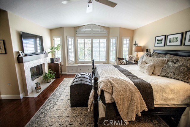 Upstairs master bedroom boasting romantic fireplace.