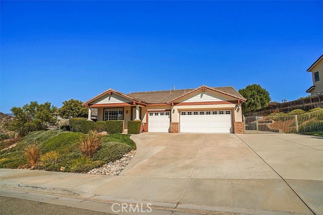 31240 Countryside Lane Castaic, California This is the SINGLE LEVEL home you have been waiting for! Tucked away in the hills of the desirable Lakeview community, this is an excellent location with beautiful mountain and lake views. Enter from the covered porch to the spacious living/dining room combo, with plenty of room for a large dining set, perfect for entertaining. The kitchen features a center island with granite countertops and opens to the family room with cozy fireplace, large media niche, (fits a 75” tv), many windows for natural light and views of the lake and mountains. Extra cabinets in the hallway lead to the primary bedroom with en suite bathroom where you can relax in the jetted tub. There are dual sinks, a vanity, separate tub and shower, and a large walk-in closet. Secondary bedrooms feature mirrored wardrobes and ceiling fans. The lovely, pool-sized yard has much to offer with an aluminum covered patio, large grassy area, fruit trees, enclosed dog run with artificial grass, Tuff shed, and no homes behind for more privacy. This is a rare single story with a 3-car garage, RV access (approx. 50’X 13’), and large driveway to park multiple vehicles. Other features include: dual-pane windows, recessed lighting, wiring for surround sound, indoor laundry with sink, and extra electrical near roof line for holiday lights. Easy access to Castaic Lake, Del Valle Park, Castaic High School, Castaic Sports Complex and Aquatic Center and much more! NO MELLO-ROOS, NO HOA!