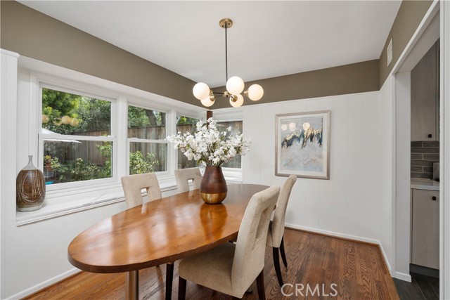 Dining room with seating bay windows