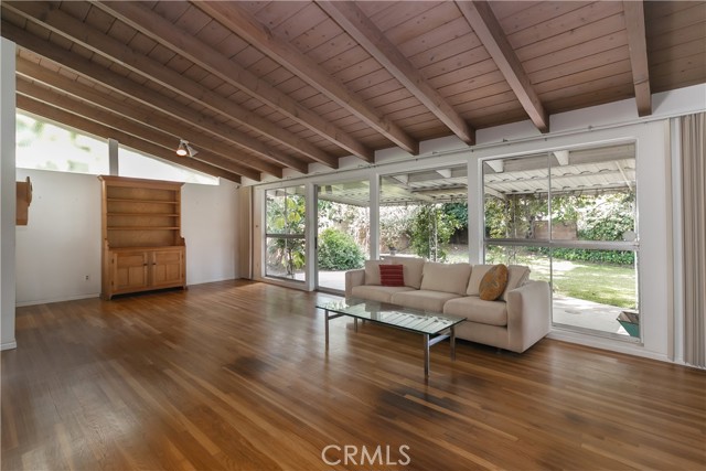 Living room with open beam ceiling