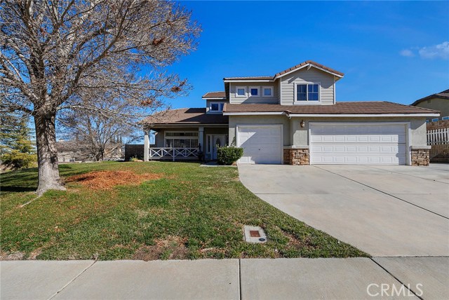 42116 Pleasant View Drive Quartz Hill, California Beautiful corner lot home, located in a desirable quiet residential street. This great home has high ceilings, formal dining, and living room areas as well as a large family room with a fireplace. The kitchen has granite countertops and a kitchen island. There are a downstairs bedroom and a full bathroom as well as a bonus room. Upstairs there is the Master Bedroom with a large deck, perfect to sit and relax and glaze the far mountains and the starry sky.
The master bathroom has a separate shower and tub as well as double sinks and a large walking closet. Also upstairs there are two other guest rooms and a hall full bathroom.
The backyard is large, with a built-in barbeque area, stamped concrete and on the side, there is plenty of space for a large RV.
Wood laminate and Tile floors throughout. The home was recently appraised way above listing price. Excellent opportunity for instant equity.
