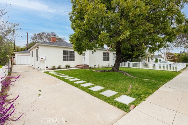 2437 Ashland Avenue Santa Monica, California A charming family home nestled in the coveted city of Santa Monica! This is a 3 bedroom, 1 bathroom home that was remodeled/rebuilt in 2017. Set upon a huge lot with a neat front lawn and prominent trees framing the exterior, enter a home filled with beautiful natural light streaming throughout. Delight in gorgeous hardwood floors installed in each room and a darling entryway stylized with the phrase “love” built into the glossy wood. A spacious living room featuring a cozy fireplace and adjoining dining room includes large French windows, all over accent moldings, and ceiling light fixtures. Join the built-in stainless-steel appliances, ample cabinetry, and stone countertops of the kitchen to partake in crafting culinary creations and an adjacent laundry area with backyard access. Each spacious bedroom in this 1,142-sqft abode enjoys large built-in closets with one room housing a set of double doors leading out to the backyard. Outside is an open patio with decking and an expansive back lawn that’s perfect for any outdoor gathering. Plus, the property includes a detached 2-car garage that can be great for an ADU. Located near Clover Park, Starbucks, Penmar Park, schools, and popular dining!