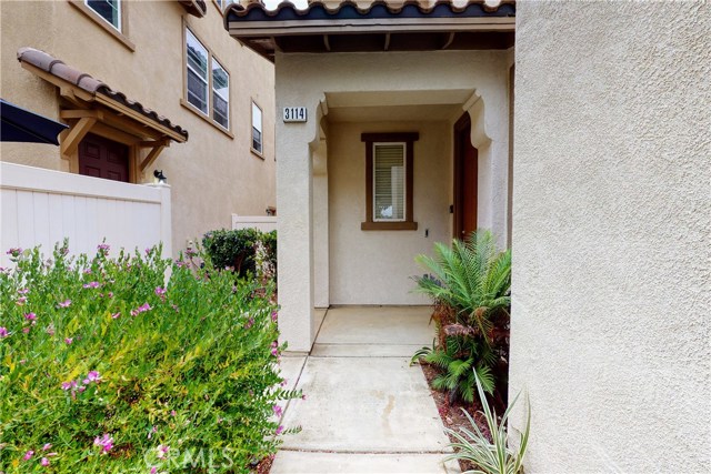3114 N Ventura Road Oxnard, California Check out the 3-D Tour: https://bit.ly/3-D3114NVenturaRd Welcome home to this stunning Riverpark townhome. No expense was spared customizing this home. Walking up to this home you’ll notice the quaint front porch with Ring doorbell. Upon entry, you’ll see the open entryway. On the second level is a beautiful open concept floor plan with wood-like vinyl flooring, gorgeous kitchen, spacious dining area, & balcony. The kitchen features granite counter tops, & stainless steel appliances including fridge. Also on this level is a bedroom, full bathroom and laundry area (Washer and Dryer Negotiable). The master bedroom is spacious with attached en-suite 4 piece bathroom. There is also a small loft/office area. Additional features are A/C & two car attached garage. The Riverpark community is conveniently located near new schools, walking trails, several parks, barbecue areas, gazebo, fountains, basketball courts, and tennis courts. Enjoy a short stroll to the “Collection” with the ANNEX, Century Theaters, Target, Whole Foods, Yardhouse, and the new Cheesecake Factory. In Riverpark, you’re not just buying a home, you’re buying a lifestyle.