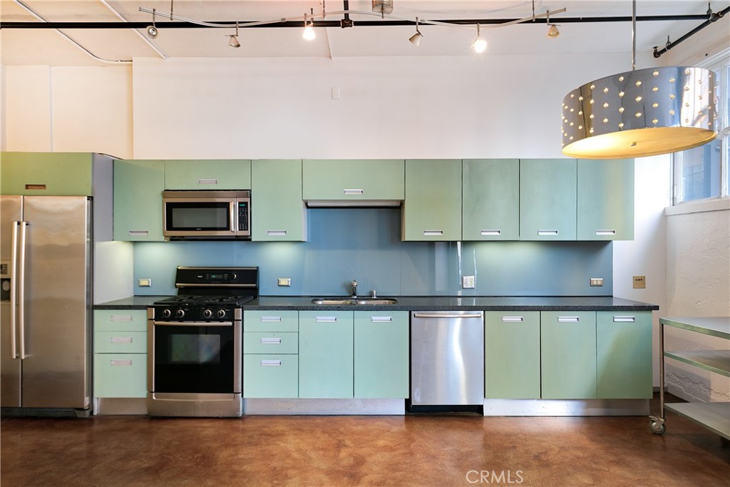 738 S Los Angeles Street Los Angeles, California Great Investment Property, Currently occupied by Excellent paying tenants.
Perfect Downtown- fashion district living. This amazing loft is located in the Historic Eckard Building which was built in 1917 and completely renovated 2007.This amazing loft was perfectly designed with polished concrete floors, oversized historic industrial windows, large italian style kitchen with stainless steel appliances, granite countertops, open floor plan with over 10 ft high ceilings. A full bathroom with shower/tub and washer and dryer in the unit.
This home offers a bedroom and an additional enclosed bonus room, perfect to be used as a second bedroom, office or studio. The extensive private patio/ backyard makes this place unique as this is an unusual offering and definitely a big plus.
This home is part of the Santee Village which offers several amenities, such as rooftop pool, spa, basketball court, driving range & sundecks, full gym facilities, conference room, beautiful courtyard with fountains, a community market and space for outdoor eating. The building has 24 hours security and courtesy patrol and as being part of the historic renovation act owners benefit by the Mills act that reduces property taxes. This unit includes one off site parking space.Walking distance to stores, restaurants and access to public transportation.
This is the only unit available for sale with all these amenities, and currently listed at a price to be sold.