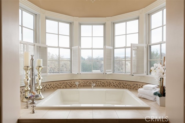 Large Spa like tub with gorgeous golf course views