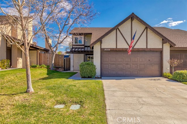 28224 Miss Grace Drive Canyon Country, California Incredible opportunity to own a home in the highly sought after American Garden II! This beautiful home has it all, approx. 1693 sq feet, 4 bedrooms (1 downstairs), 3 bathrooms. Updated, spacious kitchen with stunning granite counter tops, stainless steel appliances, breakfast bar and good size in-kitchen dining; All neutral finishes; Crown molding, upgraded baseboards and doors and recessed lighting throughout the downstairs; Awesome living room with fireplace and surround sound speakers; Dual pane windows throughout; Ceiling fans in all upstairs bedrooms and stairwell; Dual thermostats; Master bedroom has 2 spacious closets; Bathrooms have granite counter tops, stainless vanity fixtures and updated mirrors; Copper plumbing throughout; 2-car detached garage; Fantastic backyard with patio cover. HOA includes front yard landscaping roof and community amenities. Two minute walk to the community pool, park and tennis courts. Additional HOA amenities include a basketball court and volleyball court. This home won't last long! Make it yours today!