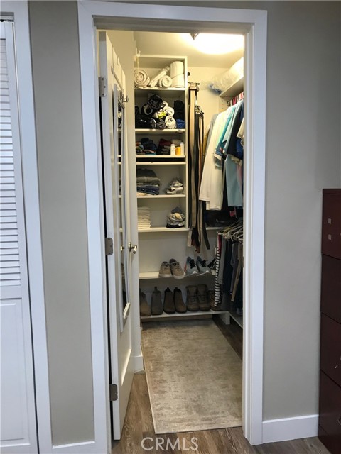 Primary bedroom walk-in closet entrance