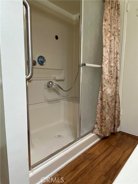 Primary Bathroom Includes Shower with Seats and Grab Bars!