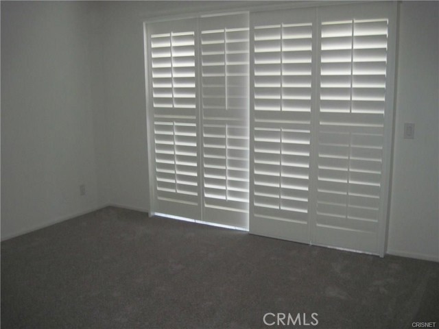 Master Bedroom with access to back patio