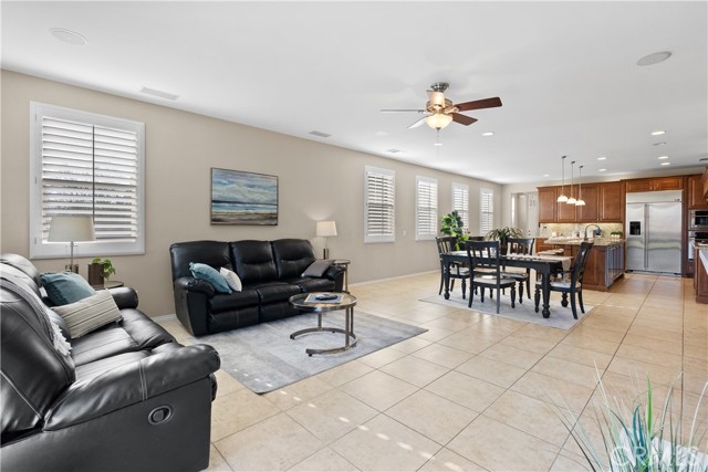 Open family room to dining area and kitchen.