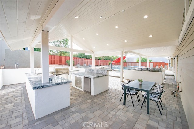 Entertainer's Patio with granite counters, wet-bar, built-in BBQ, and more.