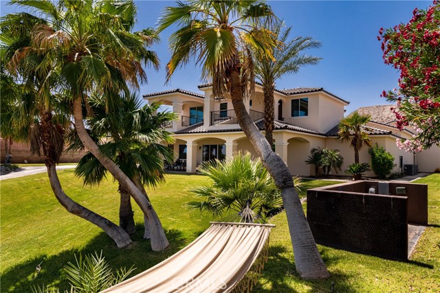 Rear view of home and yard.