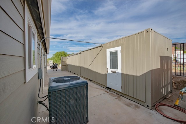 2 20' insulated shipping containers currently set-up as additional office and workshop space.