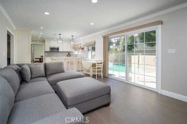 Family Room open to Kitchen & View of pool