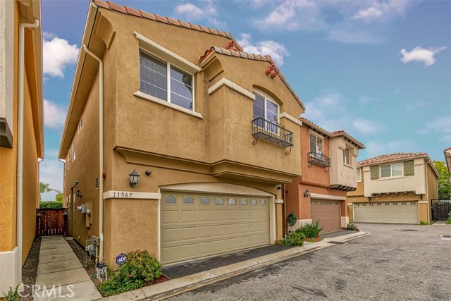 11367 Relax Lane Pacoima, California This amazing 2011 built detached and exceptionally well-cared home with NO HOA is an opportunity that does not come very often.
This home offers a beautiful kitchen with dark wood cabinets, granite counter tops and stainless steel appliances which are all included; an open living room, dining room with upgraded tile wood grain look floors throughout. As you head upstairs you get to appreciate the stylishly wrought iron stairway to land on the second floor where you will find the loft area with plenty of light coming from the skylights 3 good size bedrooms and a full bathroom ; Then as you enter through the custom arch doors you find a beautiful Master suite with a large walking closet and an upgraded master bathroom with double sinks and granite countertops. The home living room area is wired for speakers and exterior security cameras are included. There is a 2 car garage with a laundry area and as a bonus, the washer and dryer are included too. The outdoors offer a nice private patio and automatic humidity sensitive sprinklers. The solar panels are currently leased for under $50.00 a month. There is plenty of guest parking and no Mello Roos fees.
Centrally located within minutes to the Discovery Cube & Hansel Dam Recreational area and very easy access to the 210, 5 and 118 freeways for your commute.
This home is a dream come through, so don't walk, but run to check out this incredible model perfect looking home, before it is gone.