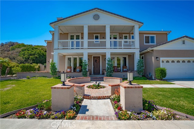 25402 Magnolia Lane Stevenson Ranch, California This stunning gem of a home is located in the prestigious Southern Oaks community, one of the most desirable neighborhoods in the Santa Clarita Valley. This gorgeous 6 bedroom pool home has front & back balconies and serene canyon views. Step inside to beautiful new luxury vinyl plank flooring throughout the entire lower level. Large downstairs bedroom suite with remodeled bath, large closet and access to the backyard is ideal for in-laws or guests. Bright and open kitchen has a large center island, black stainless steel appliances, butler's pantry and 3 sets of french doors that lead to the private backyard oasis. The office has custom built-ins with 3 separate workstations. All 5 bedrooms upstairs have hard wood flooring and 4 have access to the balconies. The owners suite has see through fireplace, private retreat, double closets, dual vanities, spacious shower and jetted tub. The backyard is nothing short of fun-filled with a pool and awesome water slide, spa, BBQ area, 2 pergola areas, fire pit and tetherball on the turf. 44 solar panels tied to a power purchase agreement, fresh paint, plantation shutters, newer windows, 2 remodeled fireplaces, surround sound, whole house fan, recessed lighting, 4 car garage and NO MELLO ROOS. But wait, there’s more - the community offers a clubhouse, pool, hot tub, and tot lot. With top performing schools, minutes to parks/hiking, shopping, restaurants and quick freeway access, if you are looking for your dream home...stop searching, you just found it!